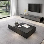 Table basse relevable noire et grise avec 3 tiroirs