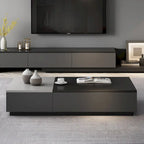 Table basse relevable noire et grise avec 3 tiroirs